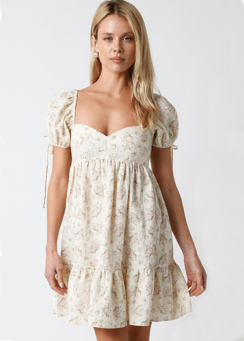 Jessie Cream and Pink Floral Babydoll Mini Dress a floral puff sleeve dress
