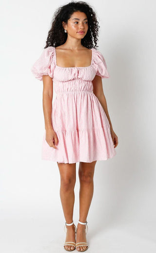 Outfit view of Kendall pink eyelet dress styled with strappy sandals