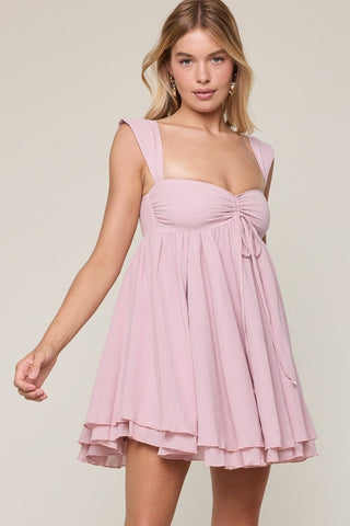 Light pink babydoll mini dress with sweetheart neckline