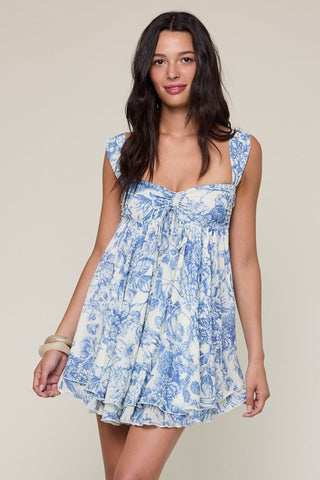 White and blue floral babydoll mini dress with sweetheart neckline