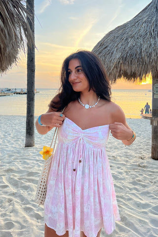 Pink floral strapless dress with babydoll silhouette