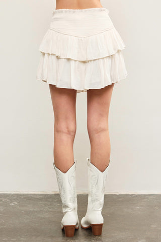 White tiered ruffle skort back view with flowy layers