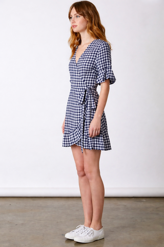 Navy and white gingham wrap mini dress side view