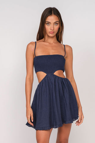 Nadia Navy Blue Cutout Mini Dress - Angled View Highlighting Cutout Waist Detail