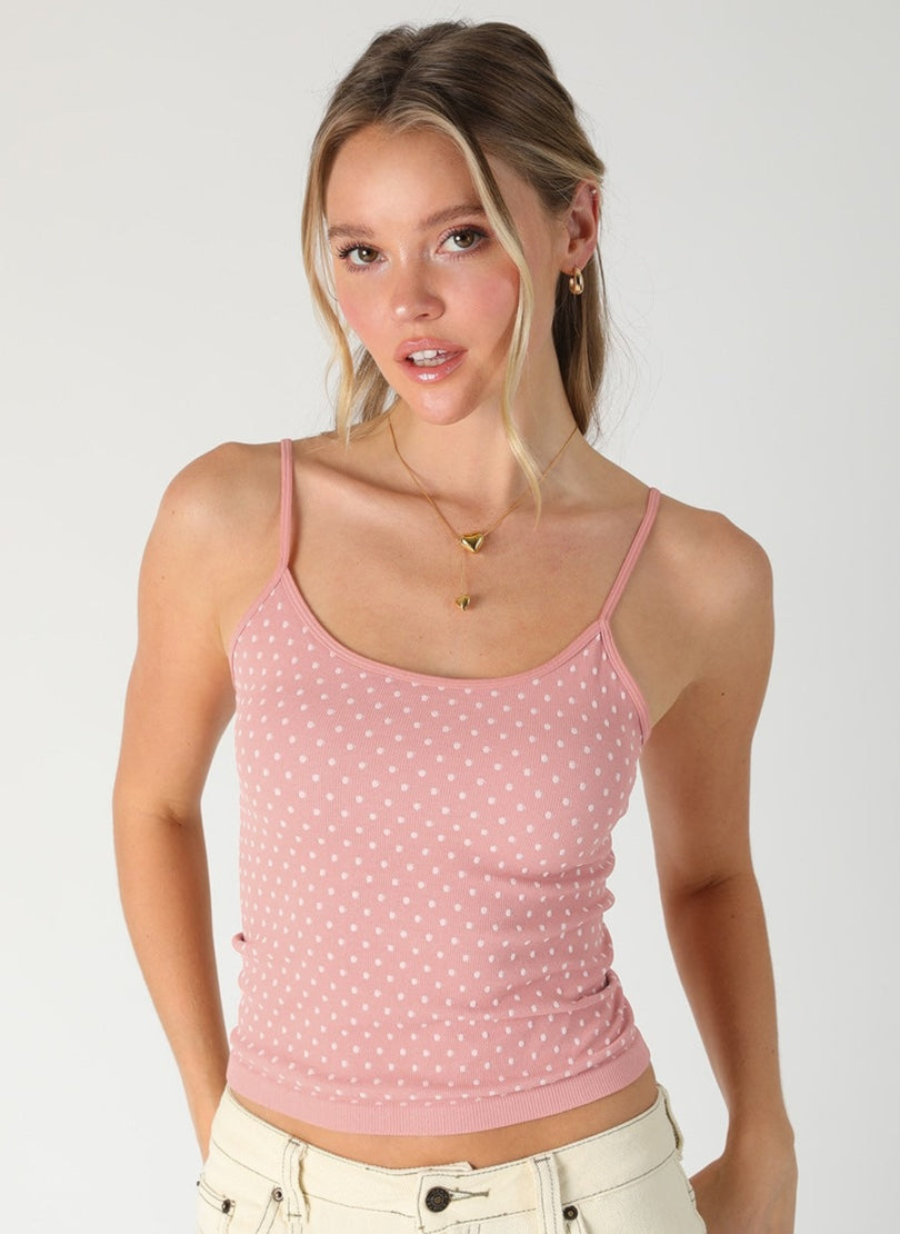Front view of NIKIBIKI Blush Pink Polka Dot Tank Top showing the dainty spaghetti straps and scoop neckline