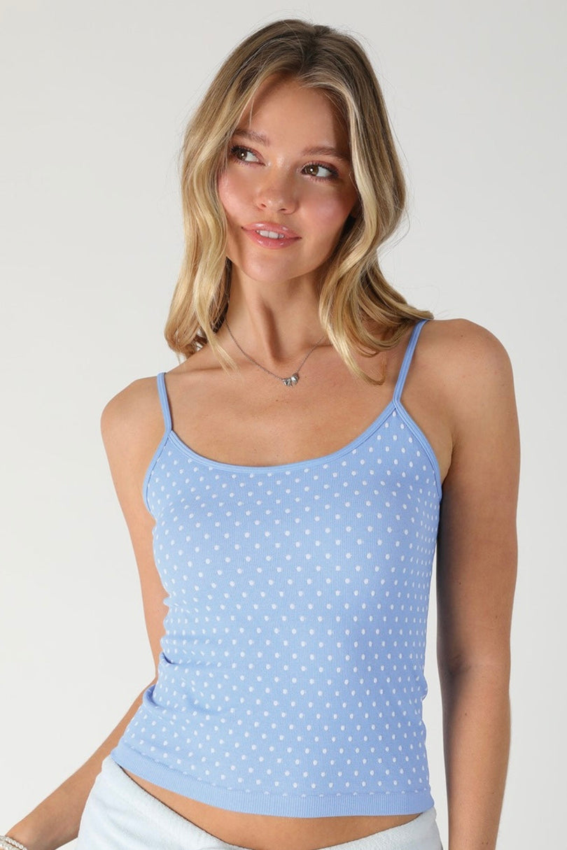 Close-up front view of the NIKIBIKI Light Blue Polka Dot Tank Top showing the spaghetti straps and scoop neckline