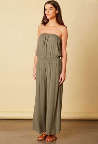 Olive strapless jumpsuit side view with wide leg pants and relaxed fit