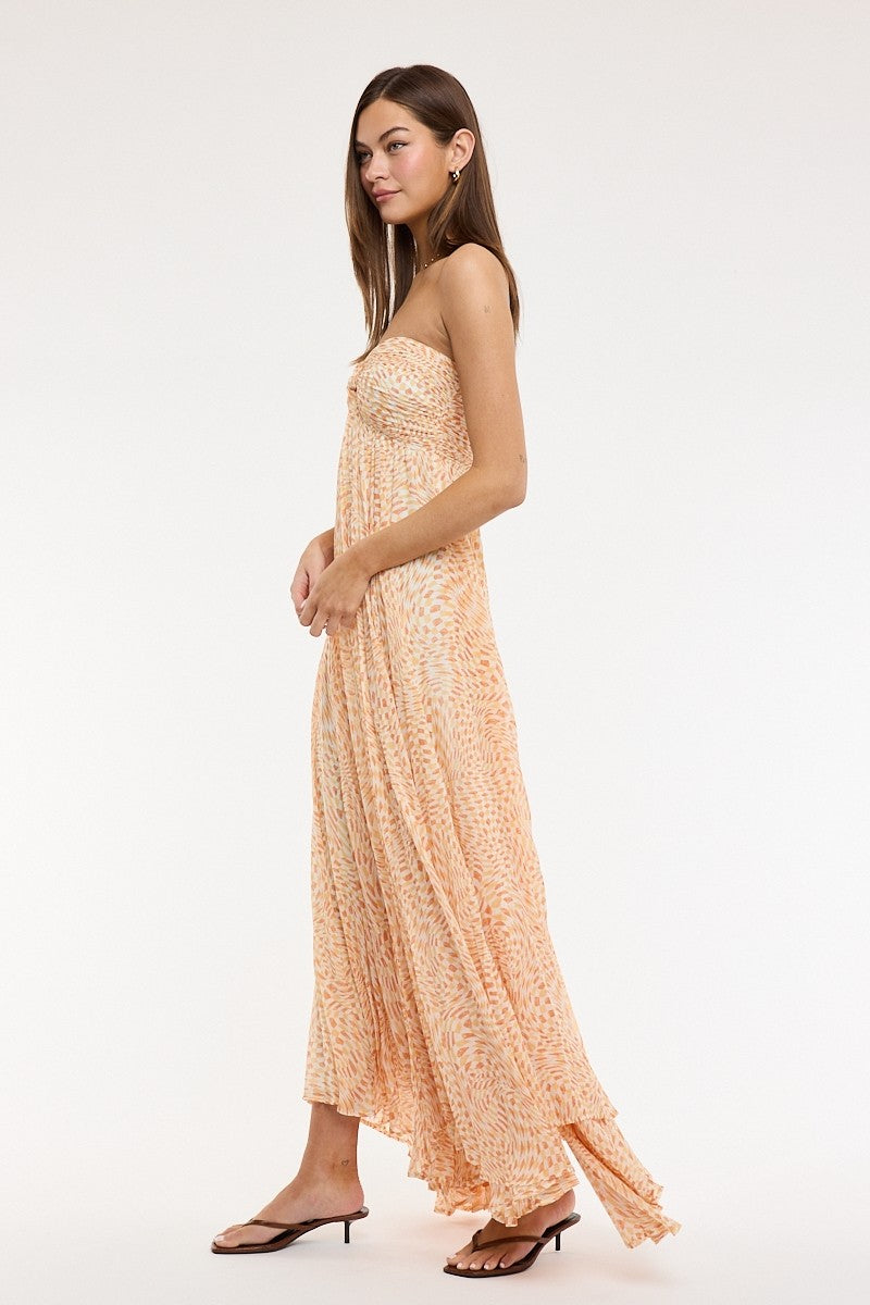 Ruched bust detail on orange print strapless maxi dress