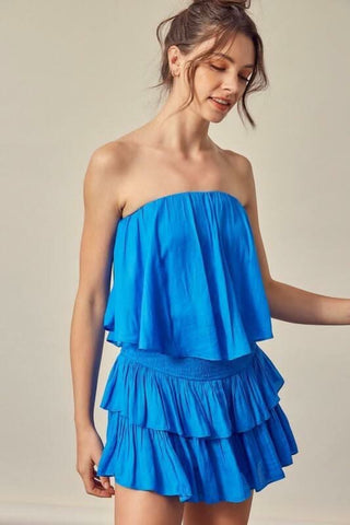 Monaco Paradise Blue Strapless Romper side angle view showing tiered ruffles