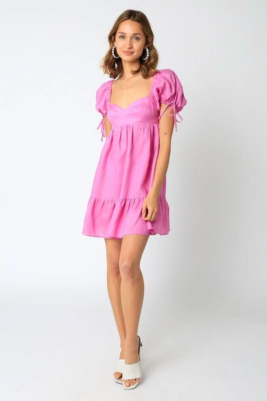 Jessie Pink Linen Babydoll Mini Dress a pink babydoll dress with puff sleeves