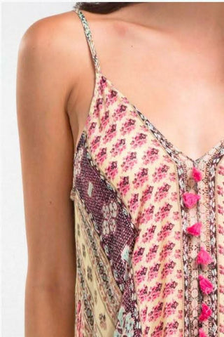 pink paisley print maxi dress detail with tassel trim and lightweight fabric