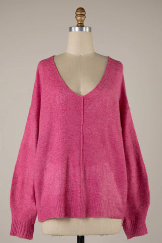 Pink oversized V-neck knit pullover sweater for women - mannequin view