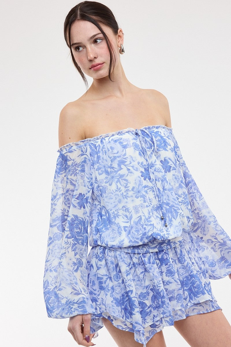 Pixie Blue Floral Off The Shoulder Romper Dress featuring long balloon sleeves and a tie-front neckline