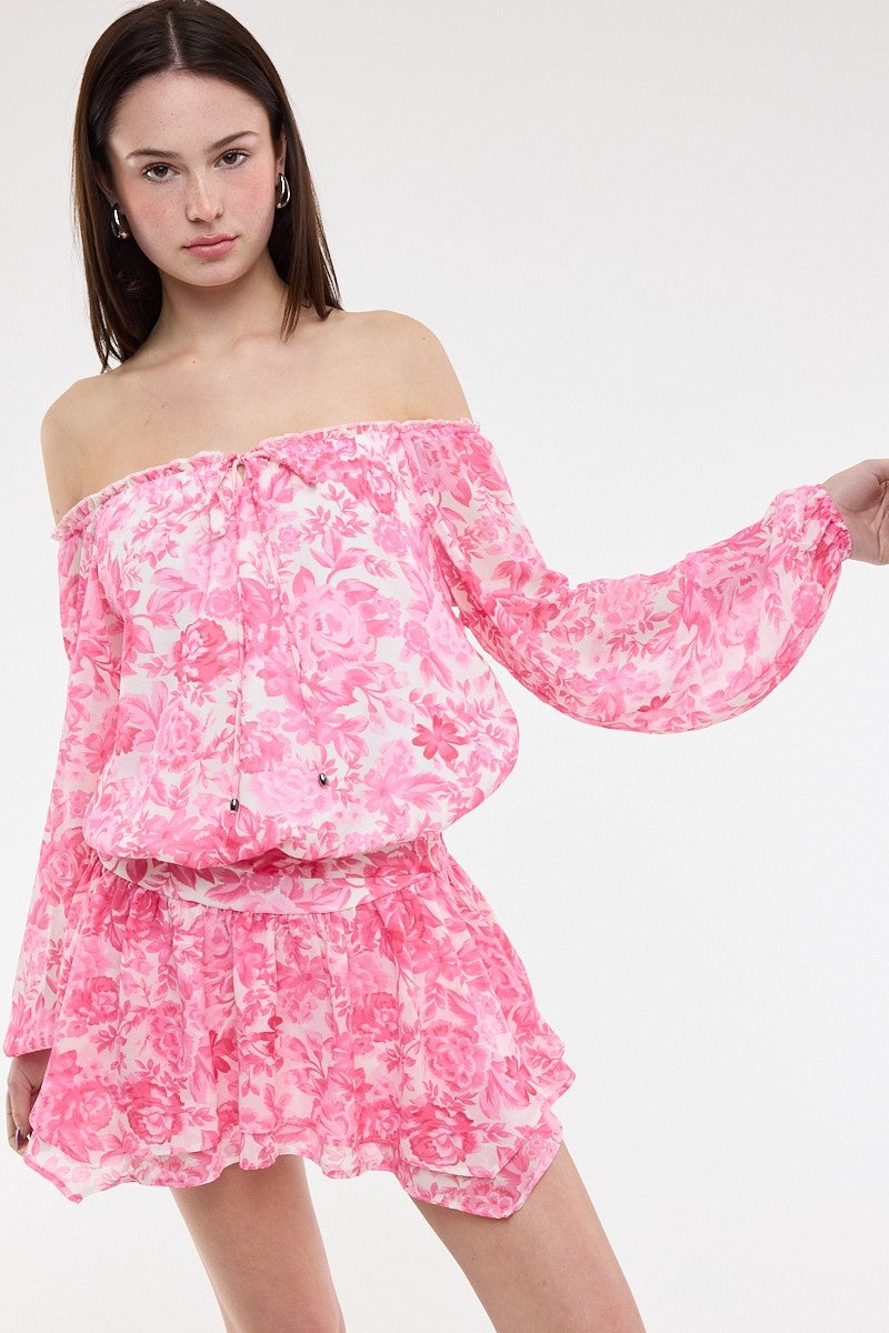 Pixie Pink Floral Off The Shoulder Romper Dress showing off the balloon sleeves