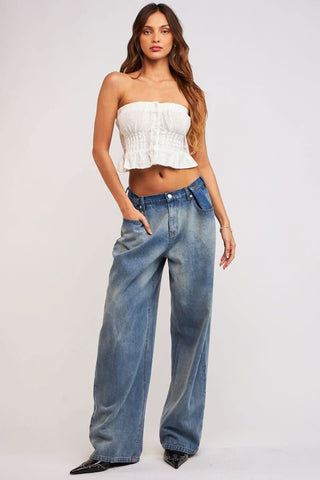 Raya White Eyelet Tube Top styled with barrel jeans and pointy black heels