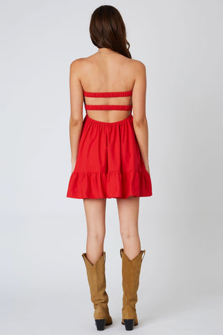 Back view of red strapless romper dress showing open back and elastic straps | Boho Pink