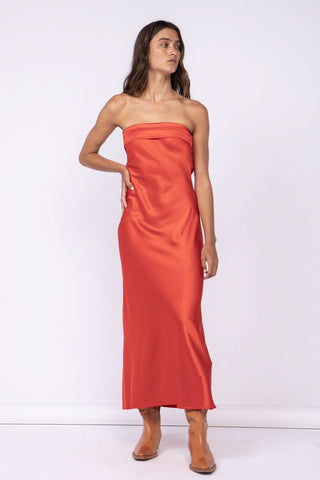 Liquid Satin Column Maxi Dress in Brick Red  styled with cowboy boots