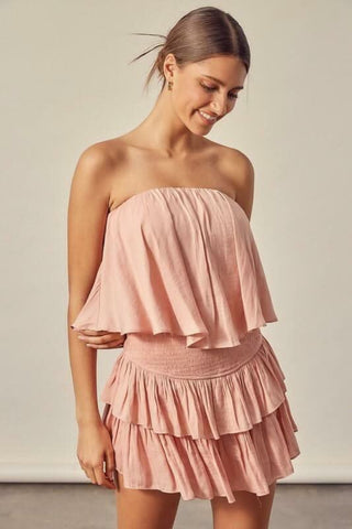 Rose strapless romper detail showing side angle view