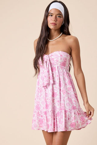 Front view of model wearing Sammie Power Pink Floral Strapless Mini Dress for graduation.