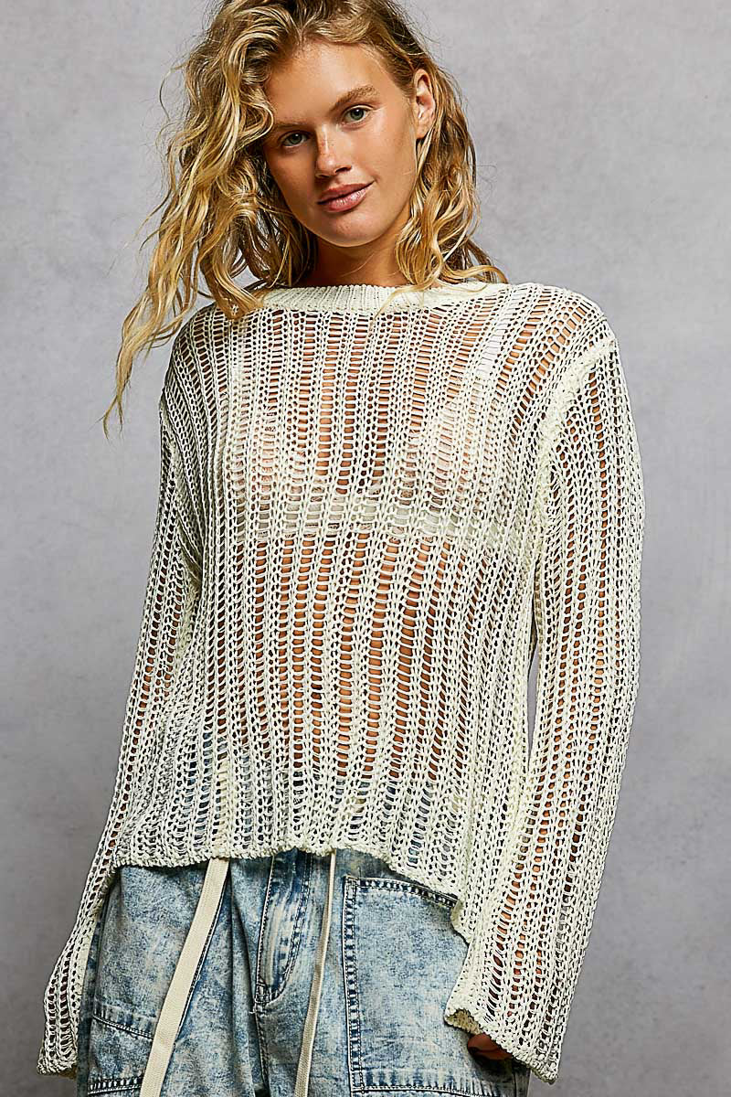 Sola White Sheer Crochet Sweater showing the round neckline and relaxed fit