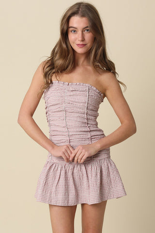 Front view of the Taryn Pink Gingham Strapless Mini Dress with a sweetheart neckline