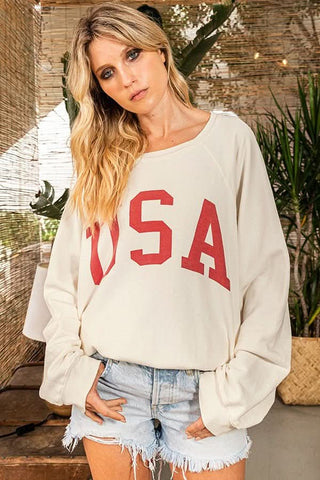 Team USA Cream Graphic Sweatshirt styled with distressed shorts