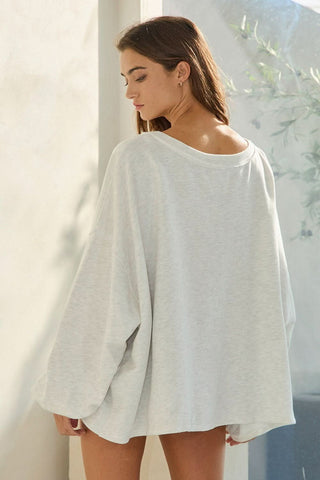 Back view of oversized sweatshirt for leggings