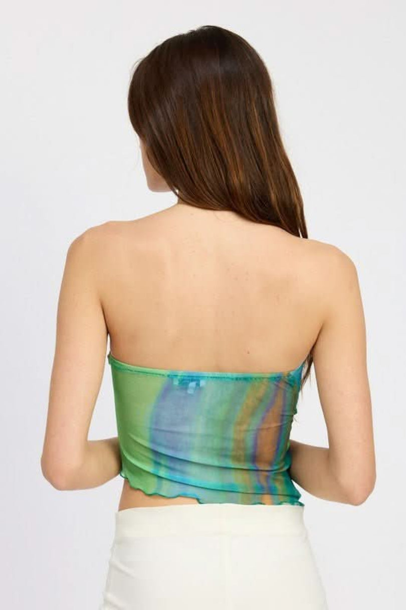 Back view of green and blue watercolor print asymmetrical tube top showing adjustable side-cinched drawstring detail and sheer mesh fabric.