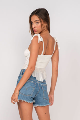 Elyse White Peplum Top - Side Angle View
