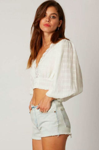 white lace long sleeve crop top side view airy fit