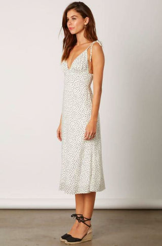 White flowy midi dress side view
