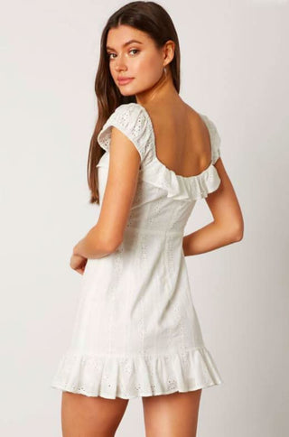 White eyelet dress with ruffled hem back view