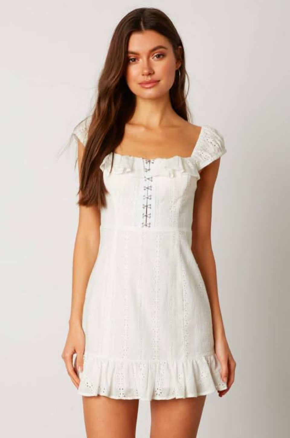 White eyelet hook and eye mini dress front view