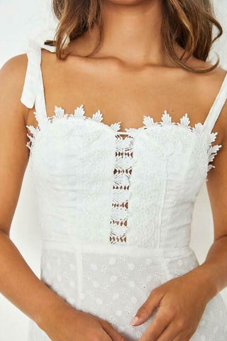 white lace mini dress with tie straps detailed view