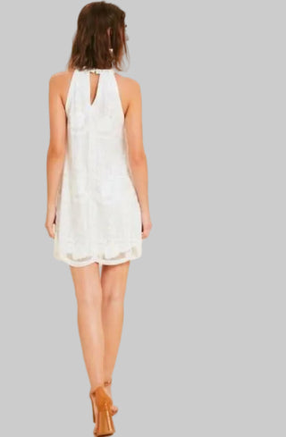 White lace mini dress back view