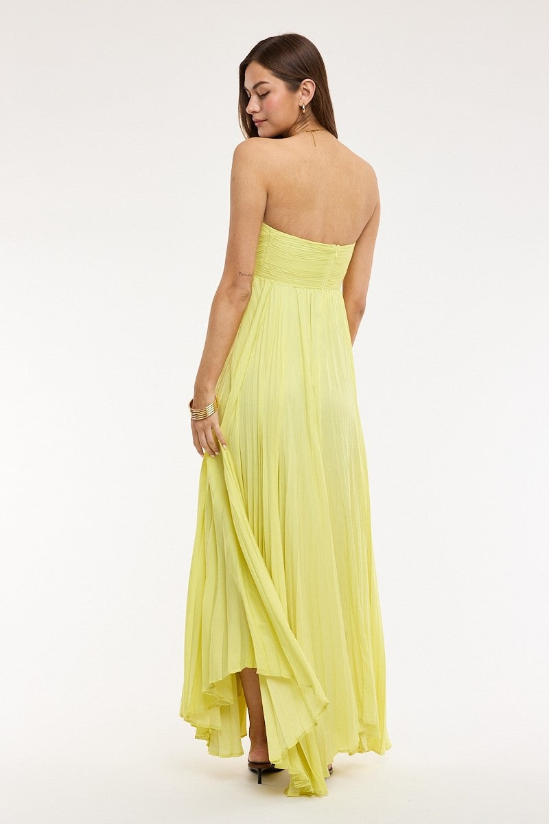 Back view of the Willow lime yellow pleated maxi dress, an elegant formal option for summer wedding guests