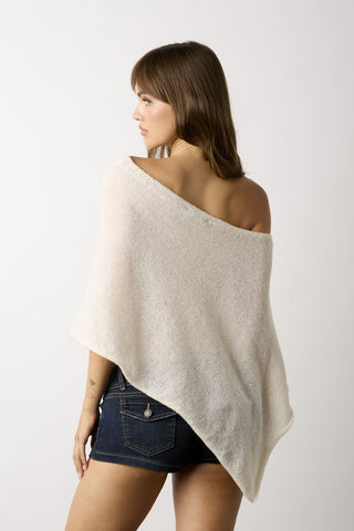 Zoya cream slouchy off-shoulder knit poncho top angled back view