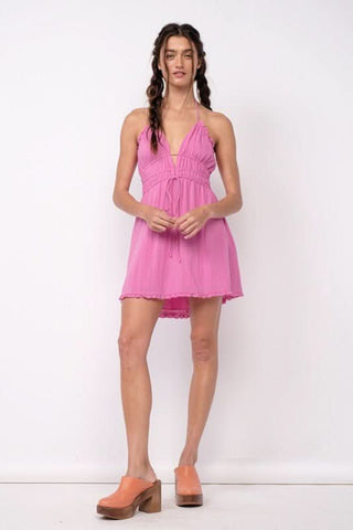 Kristen Pink Halter Mini Dress styled with pink clogs