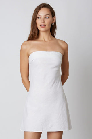 White linen-blend mini dress with cowl back and fitted bodice