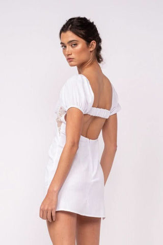 Delilah White Puff Sleeve Bustier Mini Dress side angle view | Boho Pink