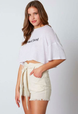 Oversized white crop top side view