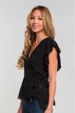 Black eyelet lace wrap top with ruffle detail - boho chic feminine blouse
