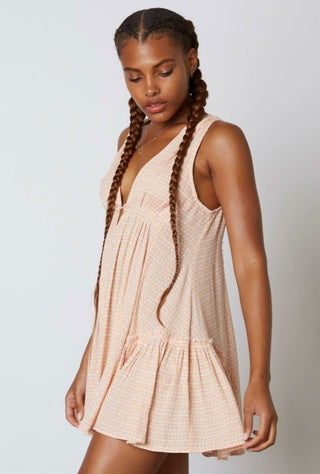 Peach and white plunge neckline mini dress