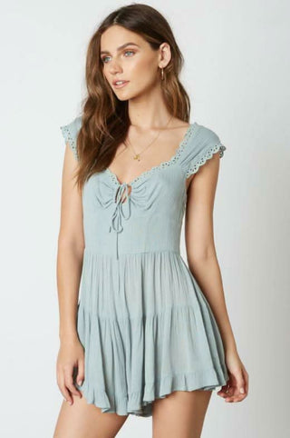 Seafoam blue vacation romper with ruffle shorts