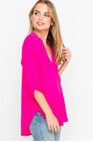 See That Girl Fuchsia Pink Roll Tab Sleeve Top styled with jeans