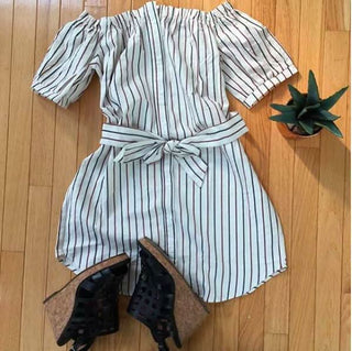 flat-lay of off the shoulder striped dress with short banded sleeves