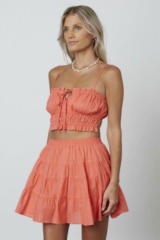 Orange/peach crop top and tiered skirt set