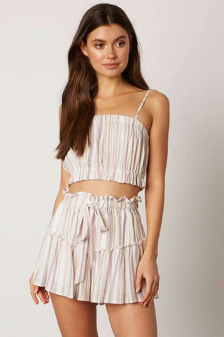 Pink striped crop top and skort set front view