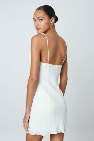 White bodycon mini dress with spaghetti straps