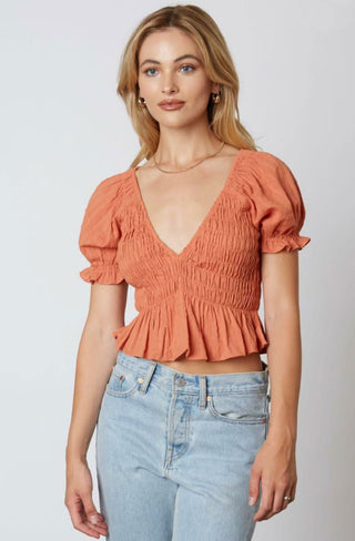 Dana Terra Cotta Smocked Puff Sleeve Ruffle Top front view